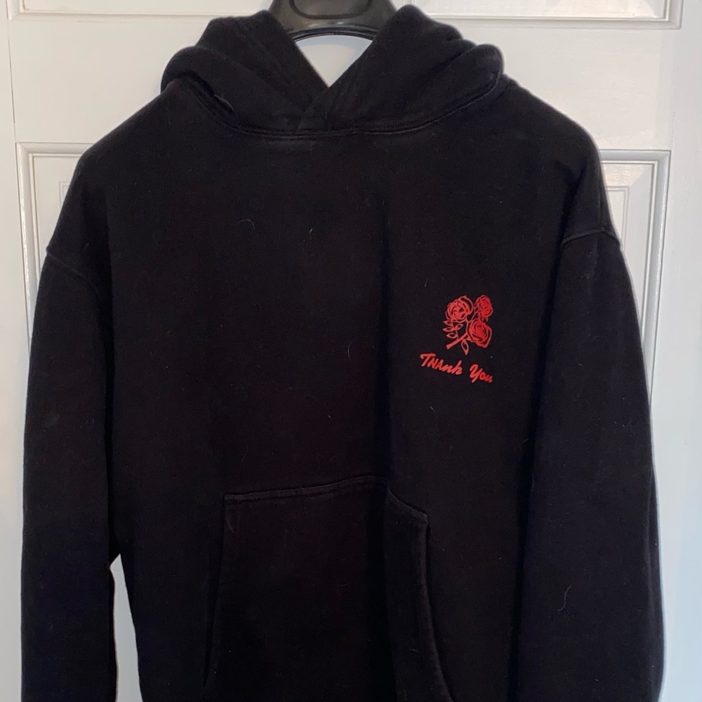 TNA hoodie. Graphic on back.